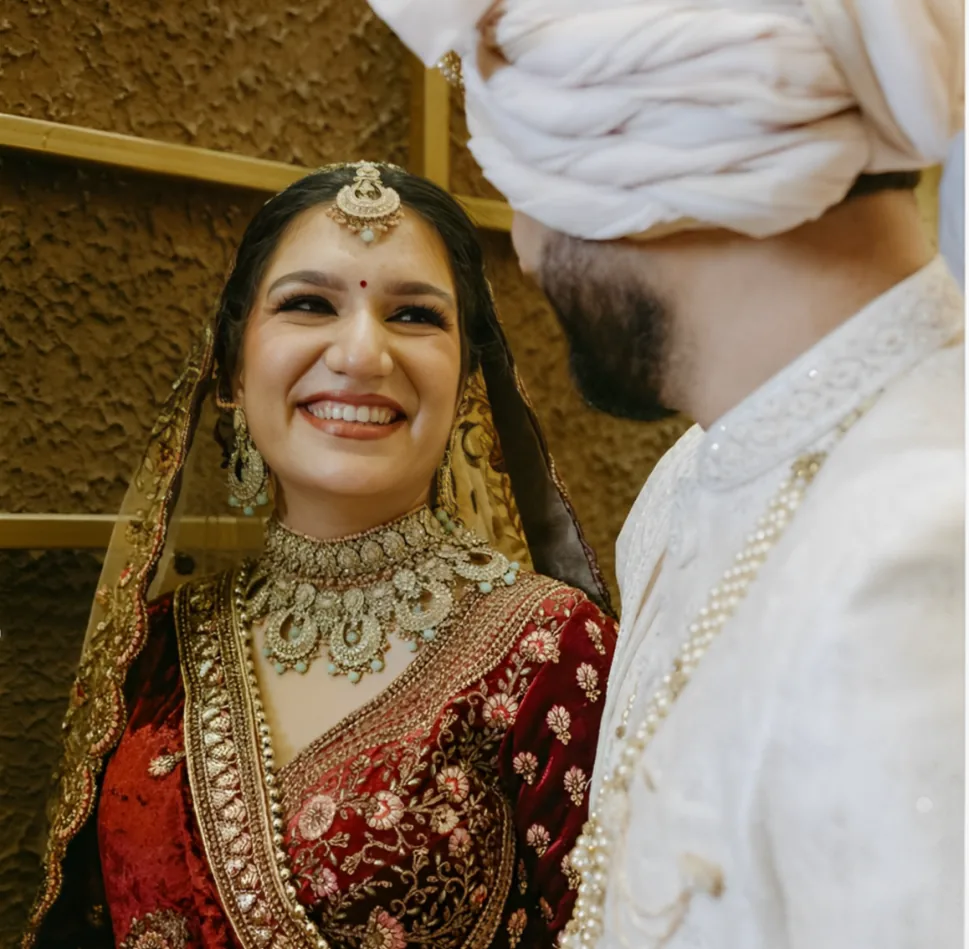 Candid wedding photographer in Noida - laughing bride captured by The Wedding Sketches