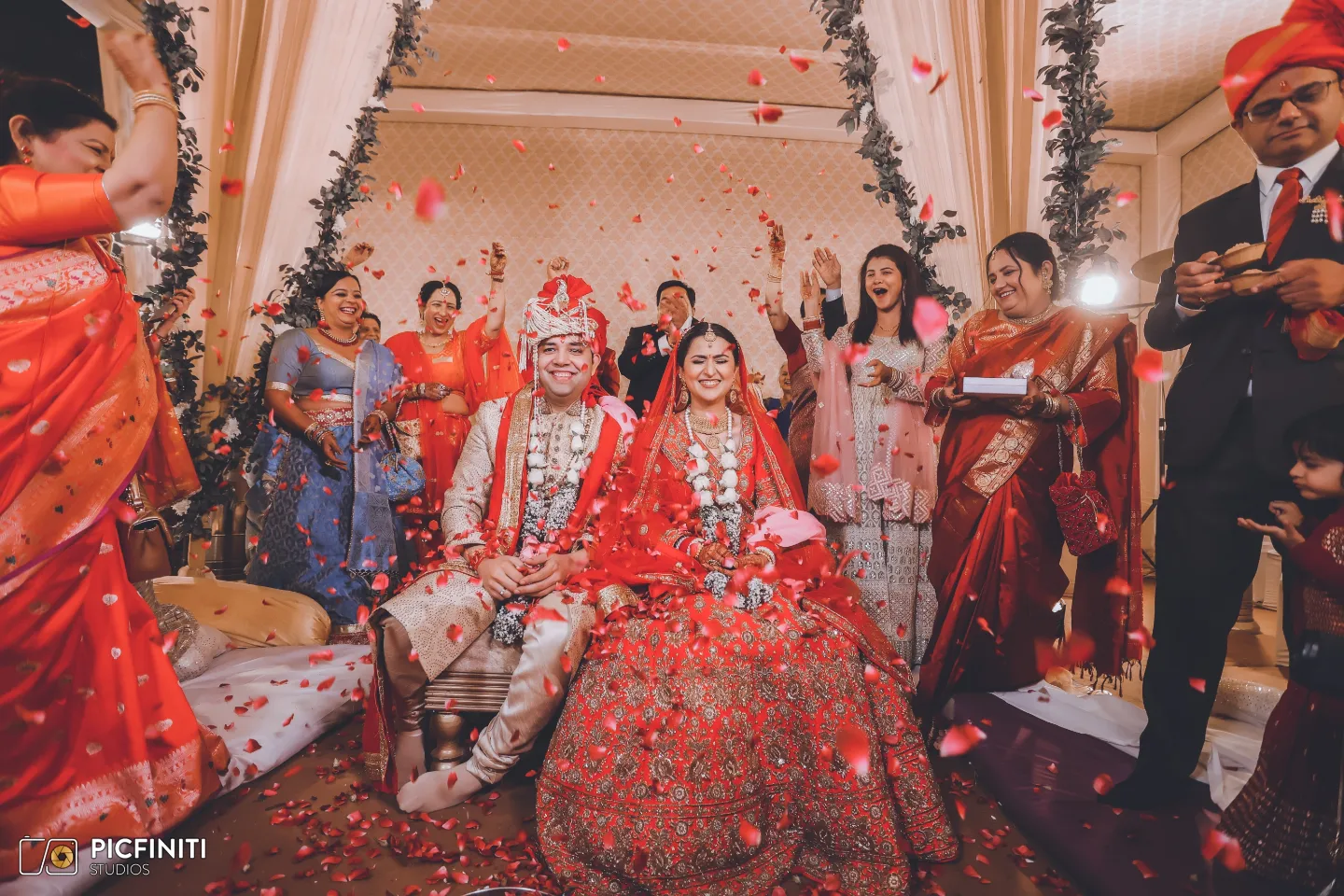 Wedding photographer near Rohini - family celebration by Picfiniti Studios, Shalimar Bagh