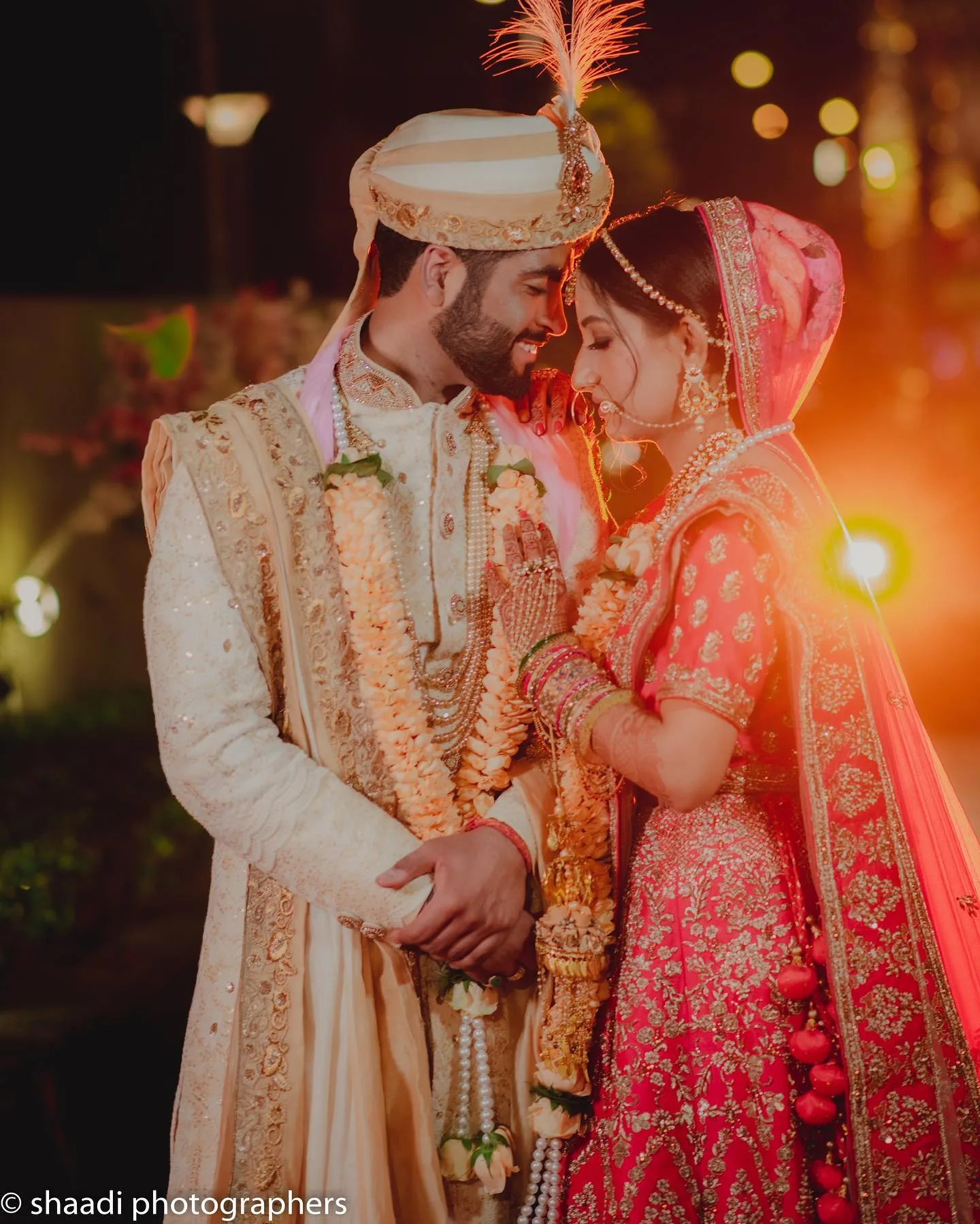 Wedding photographer in Gurgaon - bride and groom in floral garlands, portfolio photo by Shaadi Photographers