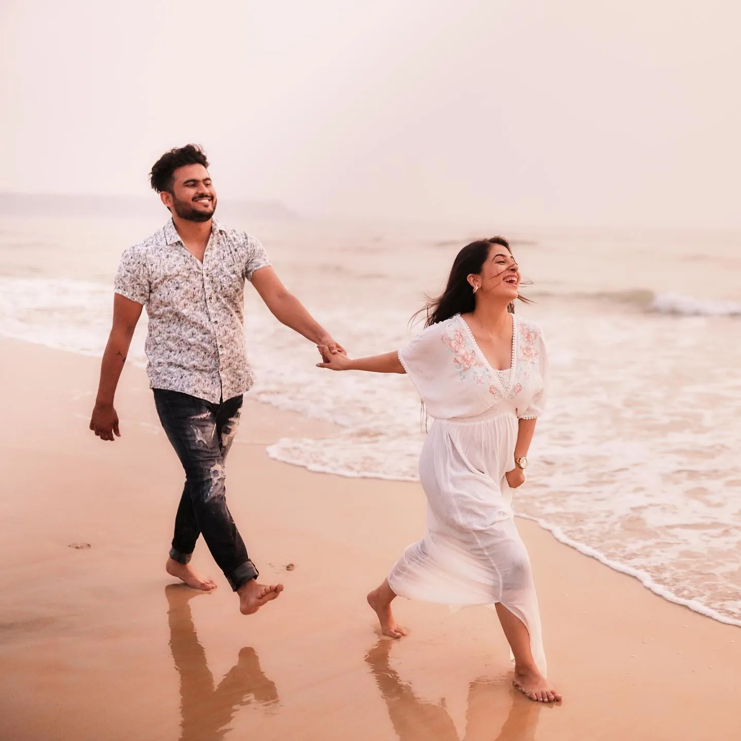 Pre wedding shoot cost Delhi NCR - couple running on the beach, by SharpShotz